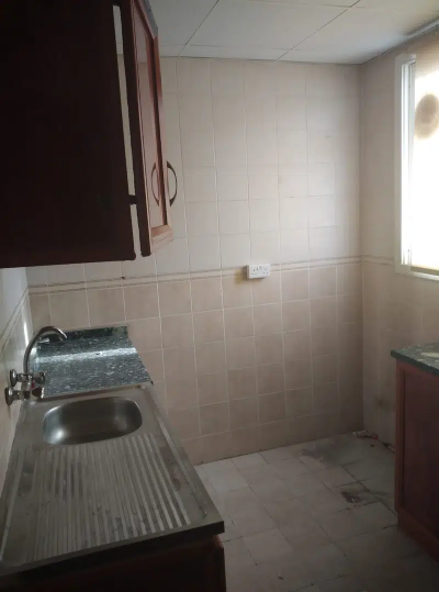 A room and a hall in the Al Bustan area for yearly rent