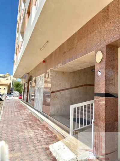 A two-room apartment with a hallway, two bathrooms, a kitchen, and a balcony is available for rent on a yearly basis for 23,000 dirhams.-6