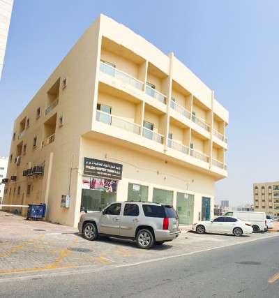 For sale a new building in Al Jurf - Ajman corner Street